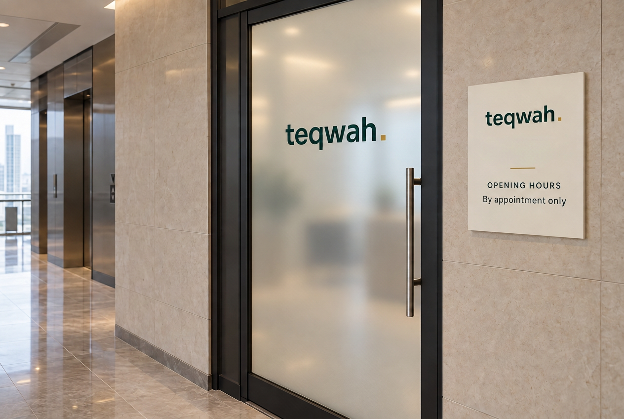 The Teqwah office entrance, with the Teqwah sign on the door and wall